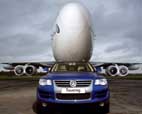 2006 Volkswagen Touareg tows Boeing 747